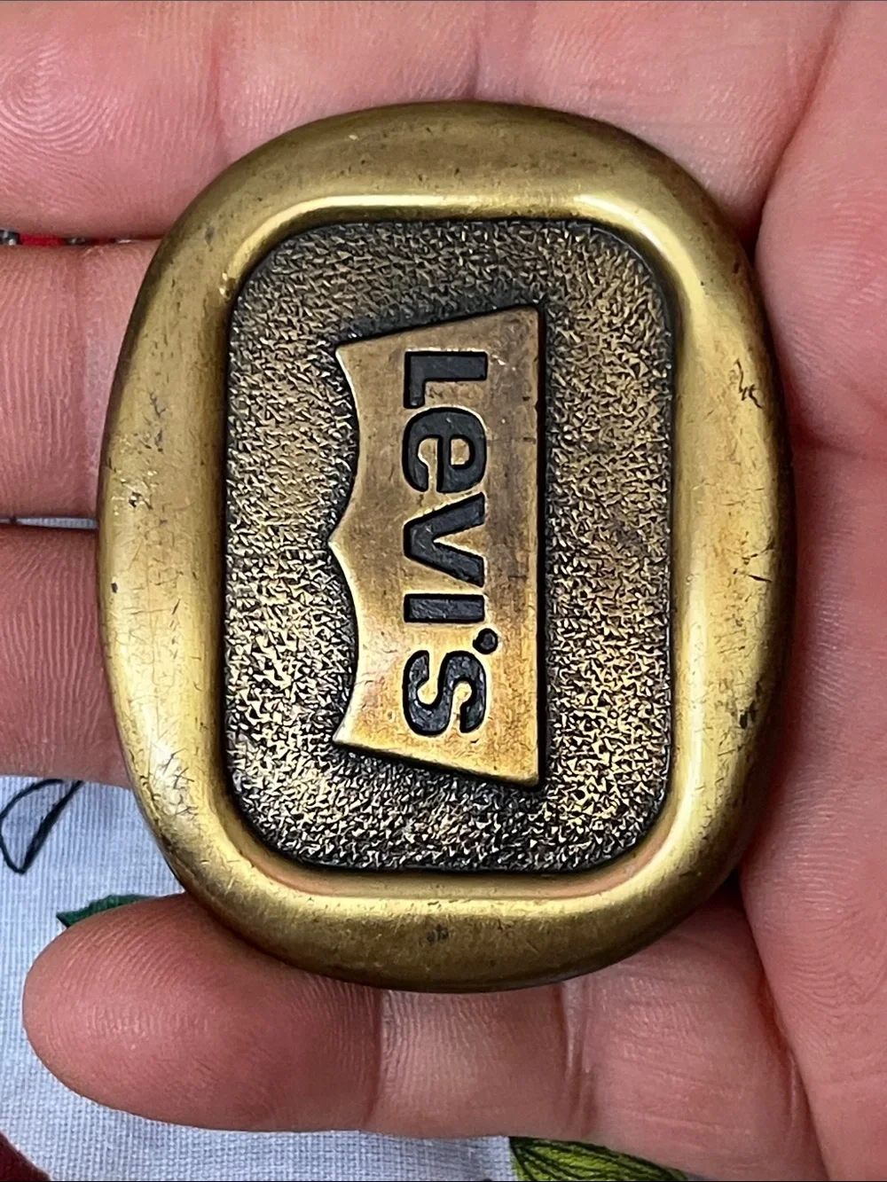 Levi's Brass-Toned Logo Buckle with Textured Panel